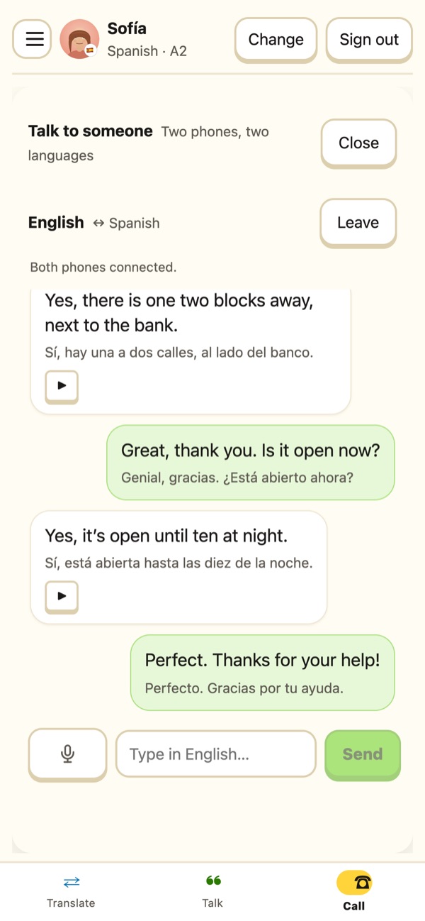 A translated call in mon-omon: English messages on one side, Spanish replies shown in English on the other